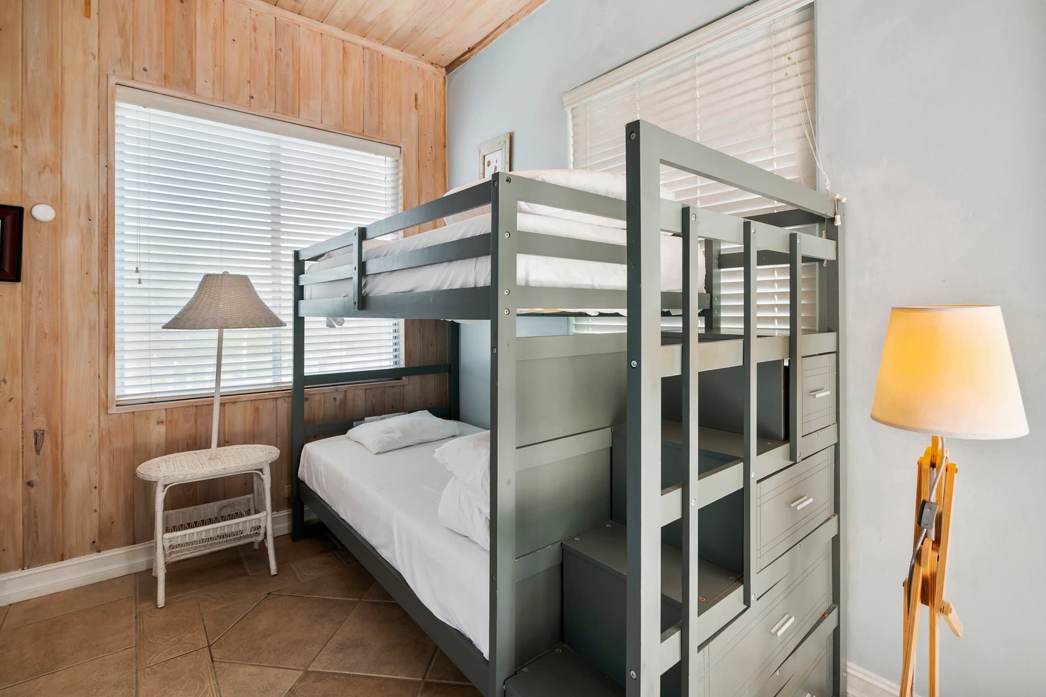 Blue Suite with queen bed and dedicated workspace at Sugar Beach Villa