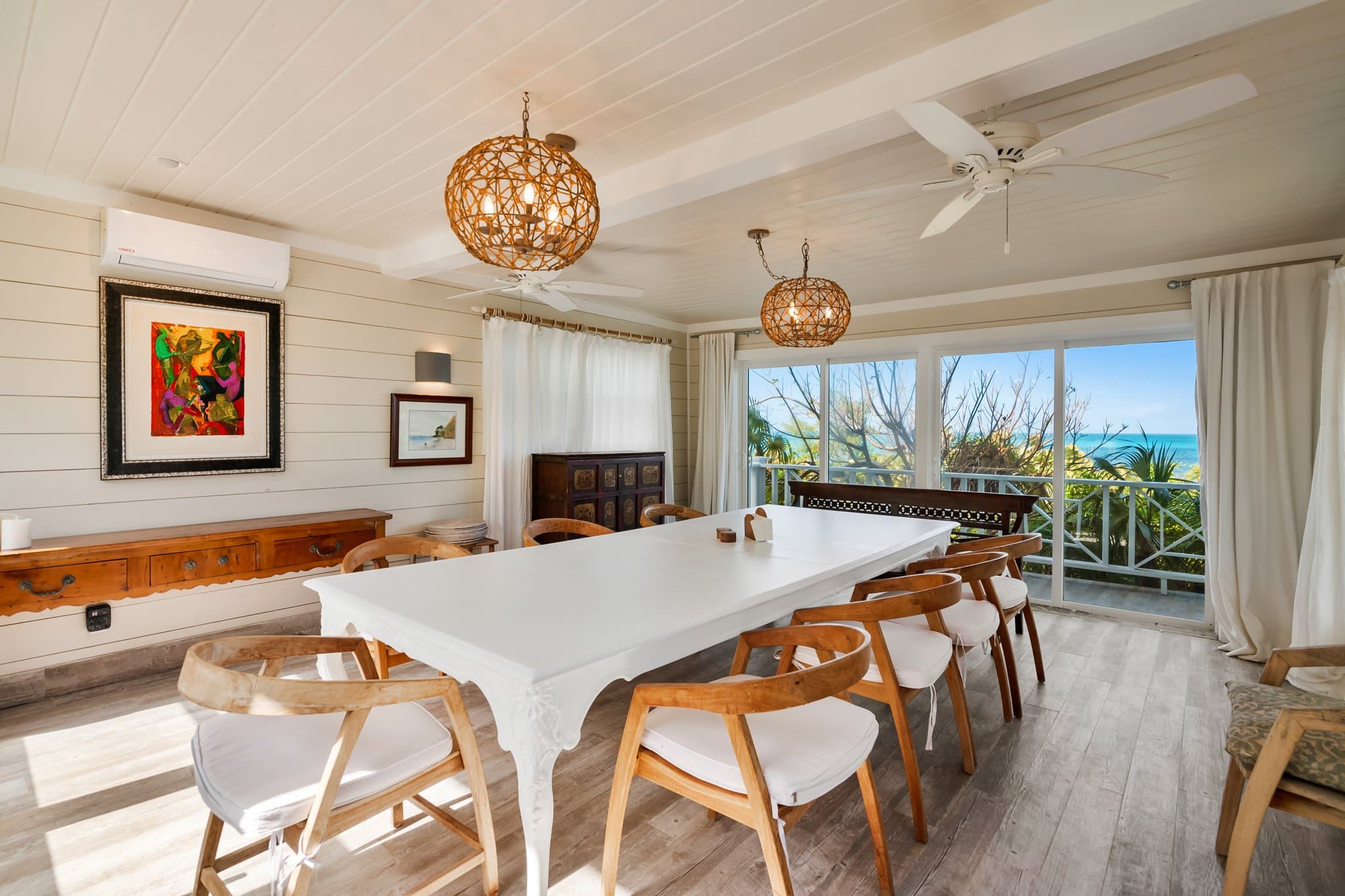 Casuarina private suite with king bed and sitting area — Sugar Beach Villa