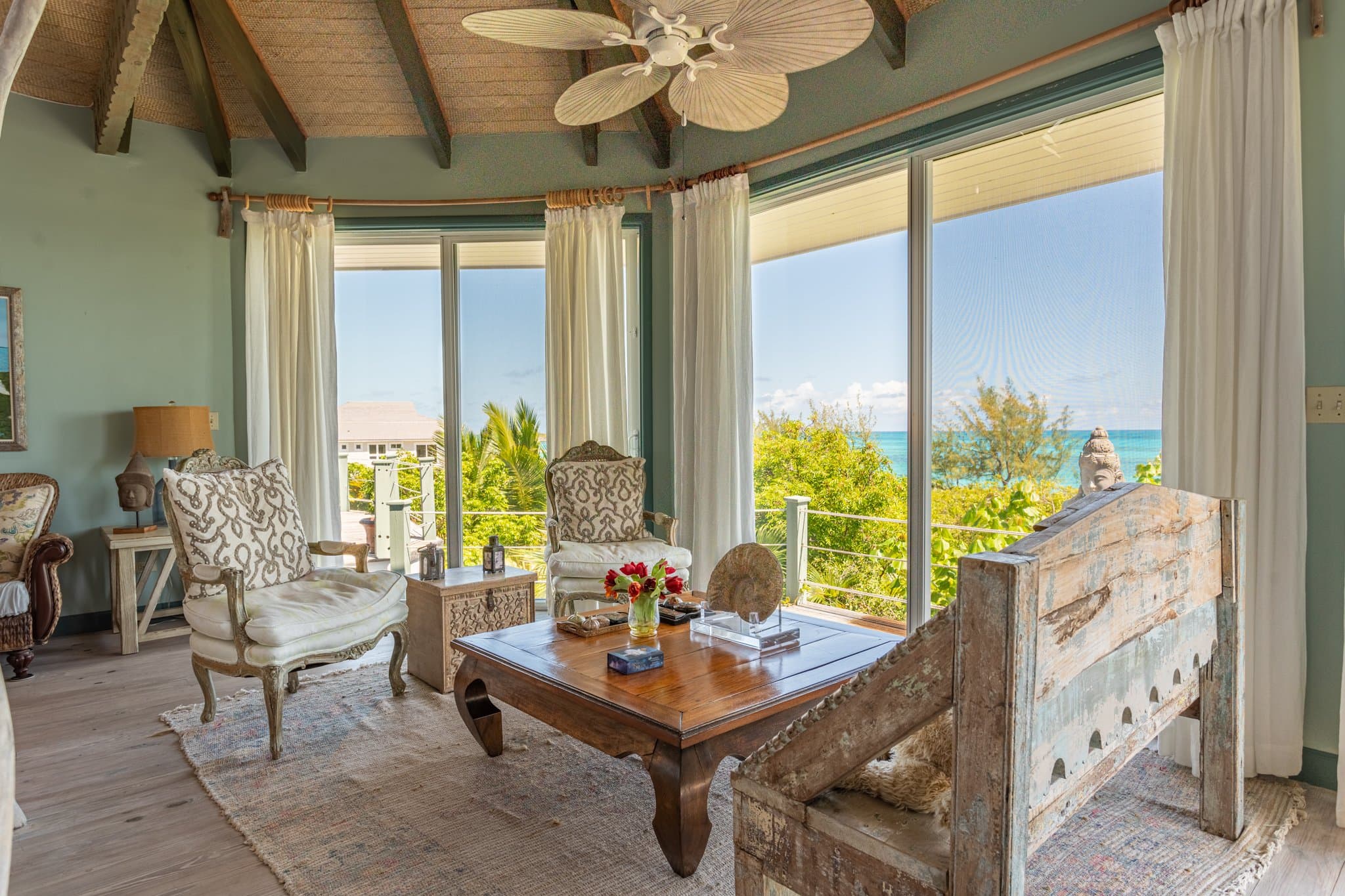 Aerial over the Sugar Beach Villa estate and the palms of Little Exuma