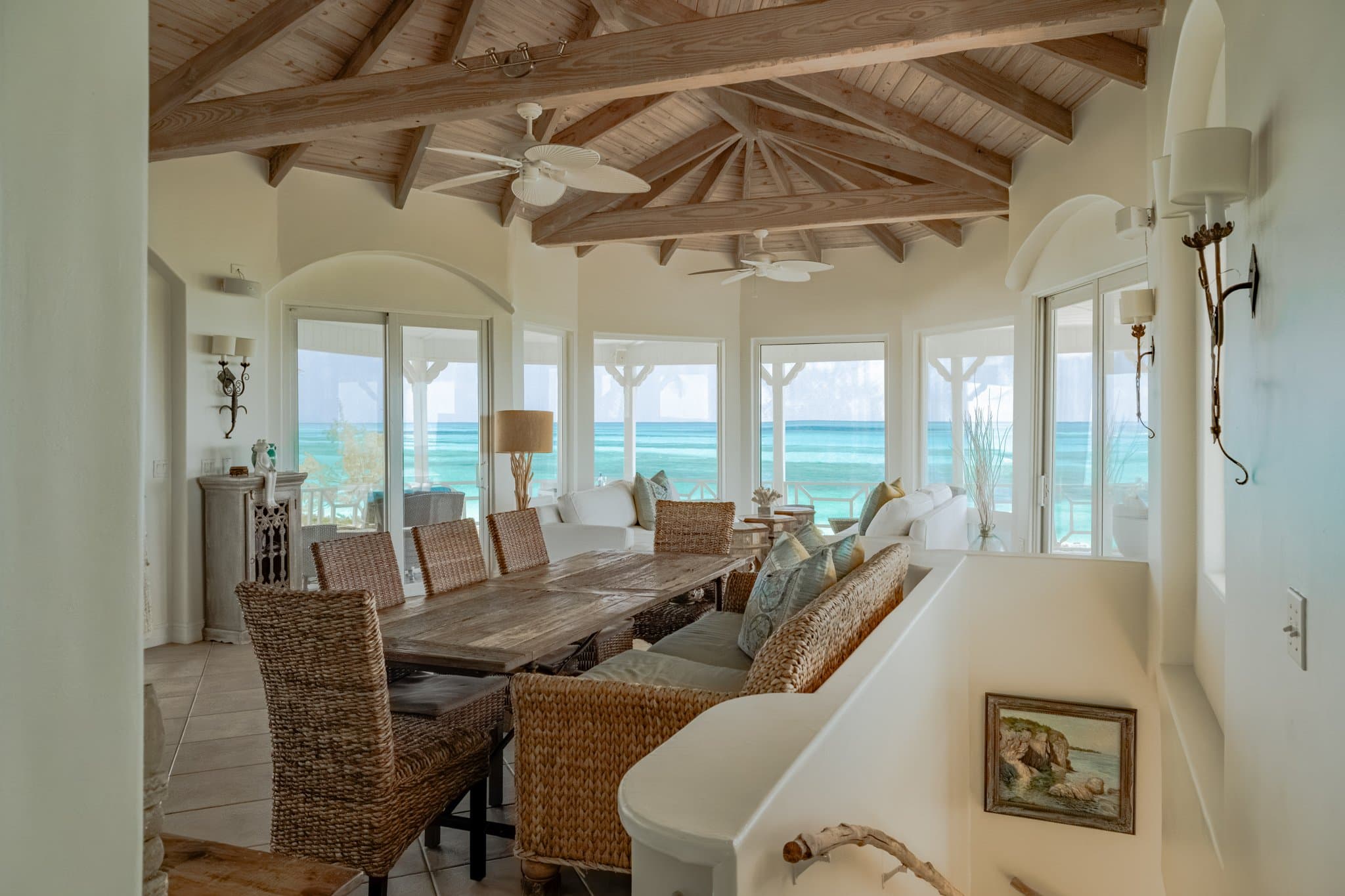 Pool deck with pergola and white loungers